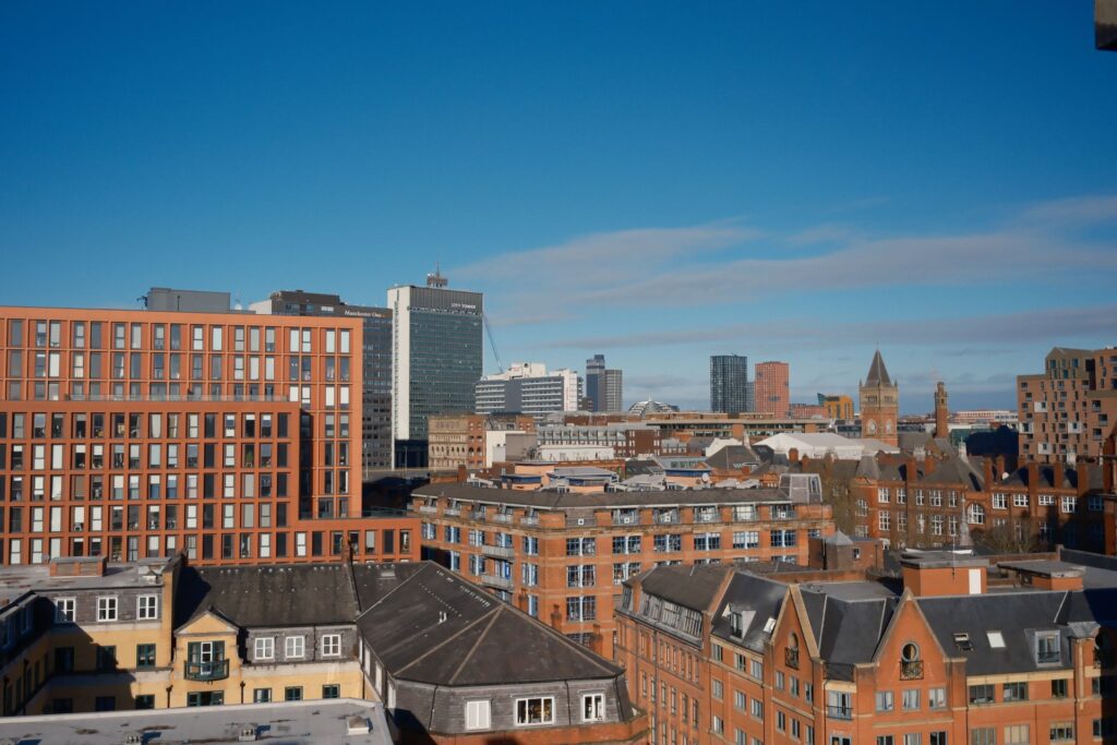 Manchester skyline on a sunny day, serving web design clients across Greater Manchester